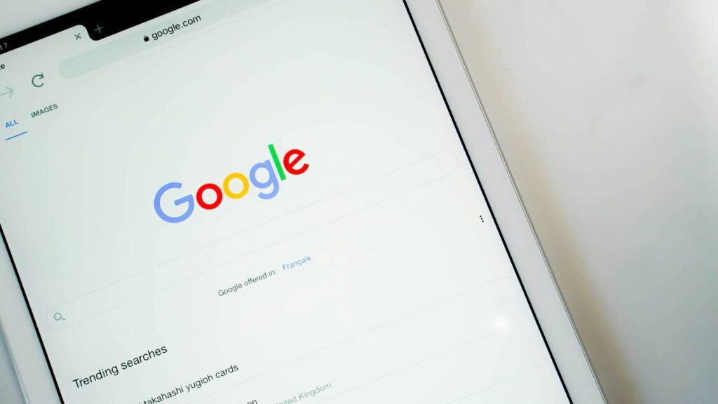 A white tablet with Google Chrome web browser on its display